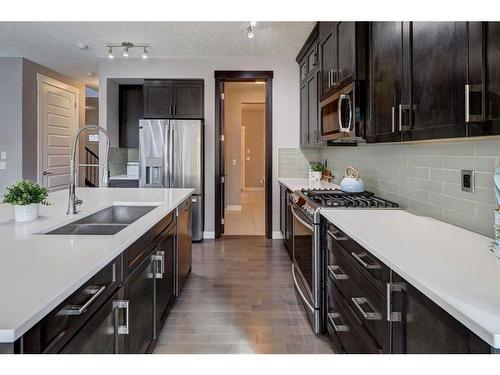 75 Nolanfield Court Nw, Calgary, AB - Indoor Photo Showing Kitchen With Double Sink With Upgraded Kitchen