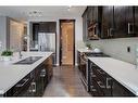 75 Nolanfield Court Nw, Calgary, AB  - Indoor Photo Showing Kitchen With Double Sink With Upgraded Kitchen 