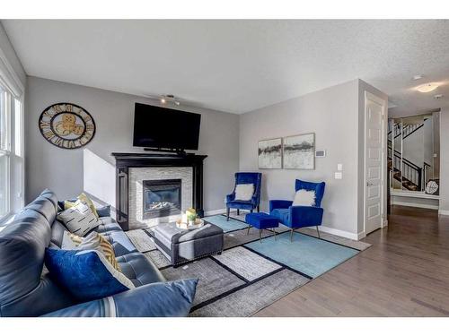 75 Nolanfield Court Nw, Calgary, AB - Indoor Photo Showing Living Room With Fireplace