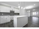 3555 Chestermere Boulevard, Chestermere, AB  - Indoor Photo Showing Kitchen With Upgraded Kitchen 