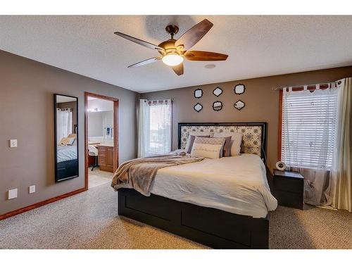 144 Springmere Road, Chestermere, AB - Indoor Photo Showing Bedroom