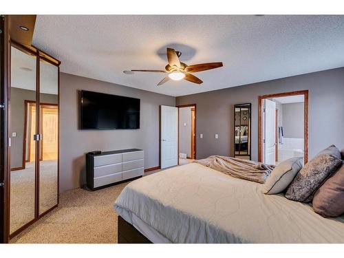 144 Springmere Road, Chestermere, AB - Indoor Photo Showing Bedroom