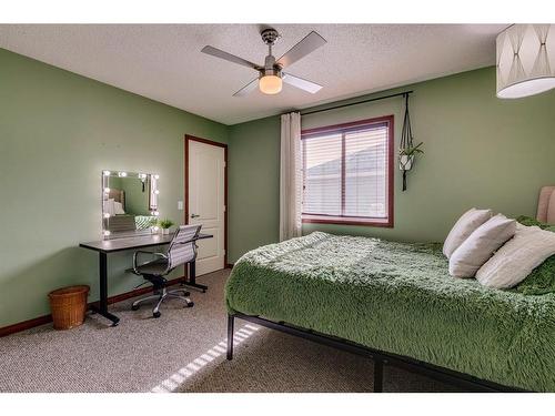 144 Springmere Road, Chestermere, AB - Indoor Photo Showing Bedroom