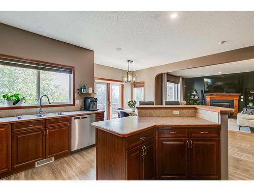 144 Springmere Road, Chestermere, AB - Indoor Photo Showing Kitchen With Double Sink