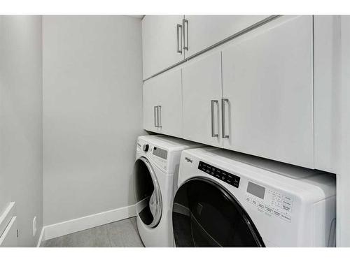 210-2717 17 Street Sw, Calgary, AB - Indoor Photo Showing Laundry Room