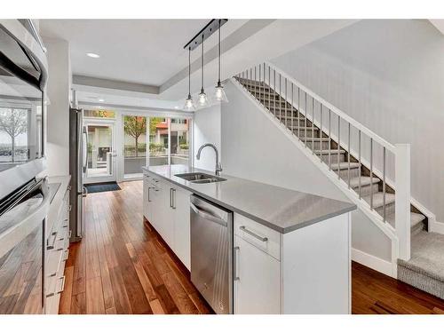 210-2717 17 Street Sw, Calgary, AB - Indoor Photo Showing Kitchen With Double Sink With Upgraded Kitchen