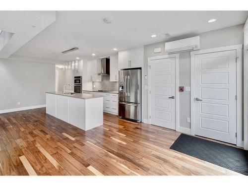 214-2717 17 Street Sw, Calgary, AB - Indoor Photo Showing Kitchen