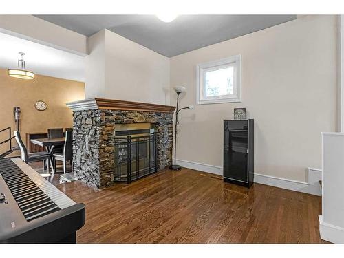 1405 24 Street Sw, Calgary, AB - Indoor Photo Showing Other Room With Fireplace