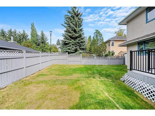 103 Scandia Bay Nw, Calgary, AB - Outdoor With Backyard