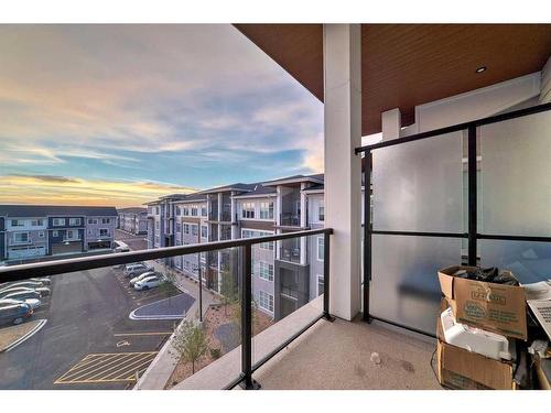 1408-681 Savanna Boulevard Ne, Calgary, AB - Outdoor With Balcony With View With Exterior