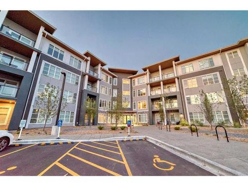 1408-681 Savanna Boulevard Ne, Calgary, AB - Outdoor With Balcony With Facade