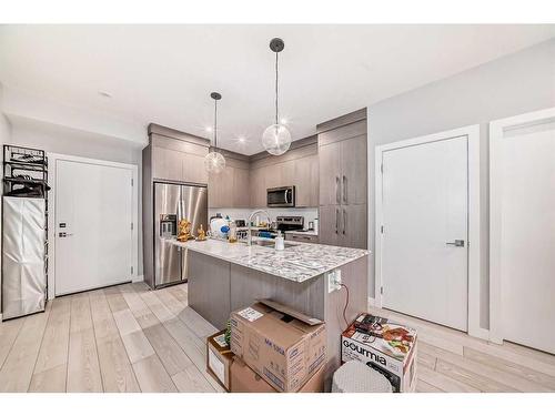 1408-681 Savanna Boulevard Ne, Calgary, AB - Indoor Photo Showing Kitchen With Stainless Steel Kitchen With Upgraded Kitchen