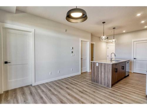 210-50 Sage Hill Walk Nw, Calgary, AB - Indoor Photo Showing Kitchen