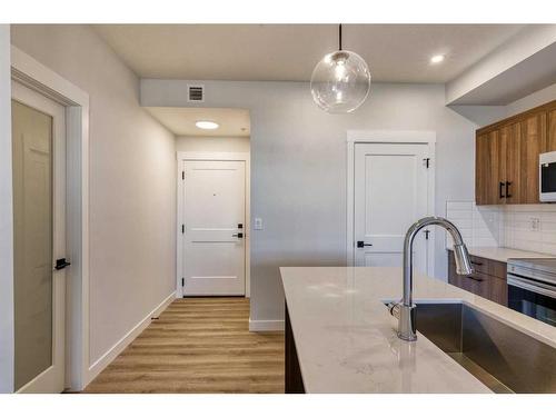 210-50 Sage Hill Walk Nw, Calgary, AB - Indoor Photo Showing Kitchen