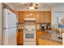 2112-5200 44 Avenue Ne, Calgary, AB  - Indoor Photo Showing Kitchen With Double Sink 