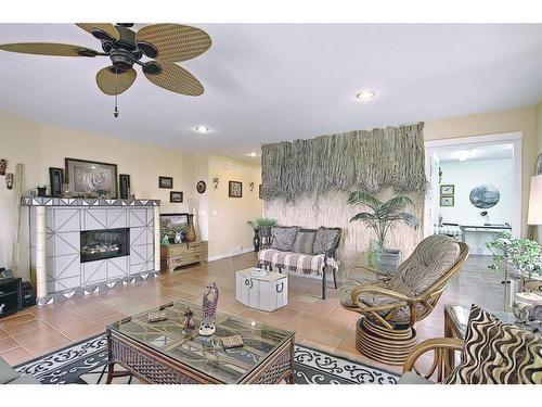 255046 Tsp Rd250 Road, Rural Wheatland County, AB - Indoor Photo Showing Living Room With Fireplace