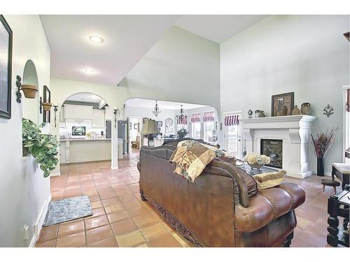 255046 Tsp Rd250 Road, Rural Wheatland County, AB - Indoor Photo Showing Living Room With Fireplace