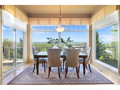 7787 Springbank Way Sw, Calgary, AB - Indoor Photo Showing Dining Room