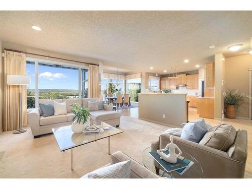 7787 Springbank Way Sw, Calgary, AB - Indoor Photo Showing Living Room