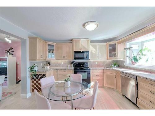 2417 53 Avenue Sw, Calgary, AB - Indoor Photo Showing Kitchen With Double Sink