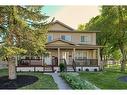 2417 53 Avenue Sw, Calgary, AB  - Outdoor With Deck Patio Veranda With Facade 