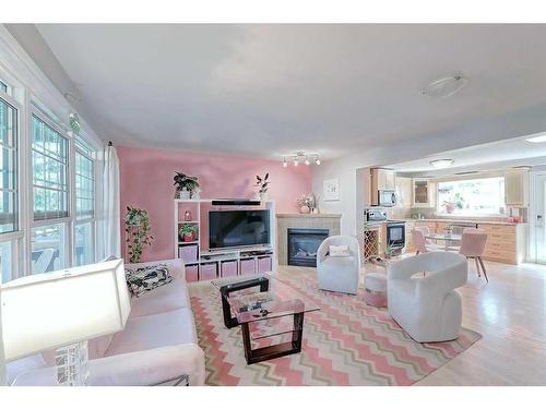 2417 53 Avenue Sw, Calgary, AB - Indoor Photo Showing Living Room With Fireplace