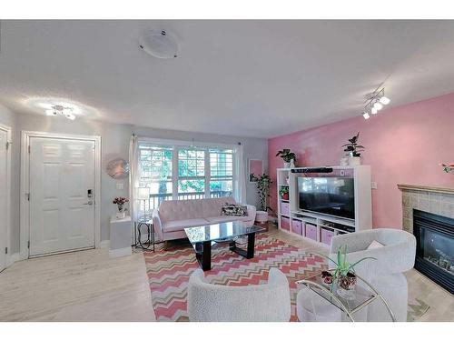 2417 53 Avenue Sw, Calgary, AB - Indoor Photo Showing Living Room With Fireplace