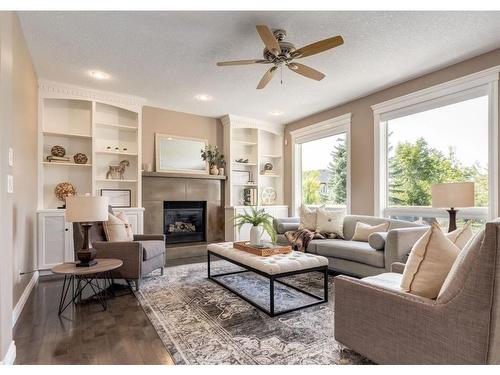 53 Strathlea Court Sw, Calgary, AB - Indoor Photo Showing Living Room With Fireplace