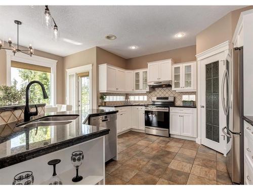 53 Strathlea Court Sw, Calgary, AB - Indoor Photo Showing Kitchen With Stainless Steel Kitchen With Double Sink With Upgraded Kitchen