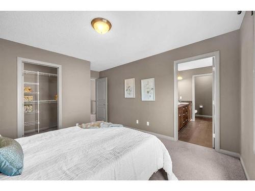 118 Aspen Hills Drive Sw, Calgary, AB - Indoor Photo Showing Bedroom