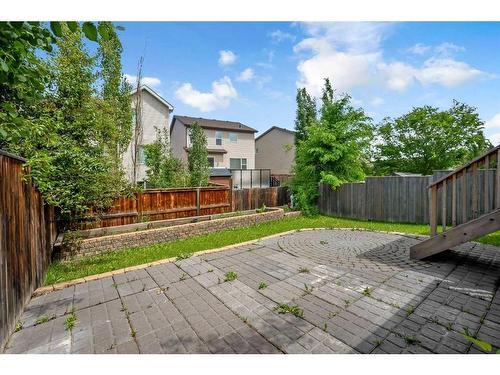 118 Aspen Hills Drive Sw, Calgary, AB - Outdoor With Deck Patio Veranda With Backyard