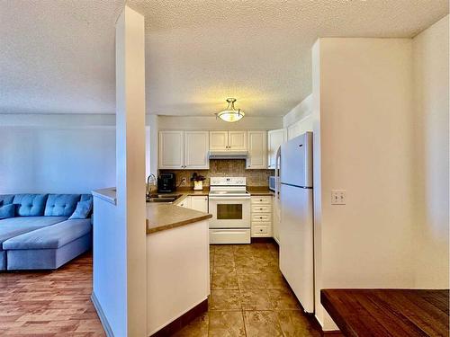 417-3000 Somervale Court Sw, Calgary, AB - Indoor Photo Showing Kitchen