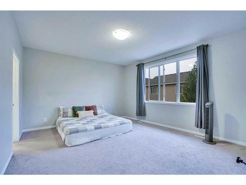 59 Osborne Common Sw, Airdrie, AB - Indoor Photo Showing Bedroom