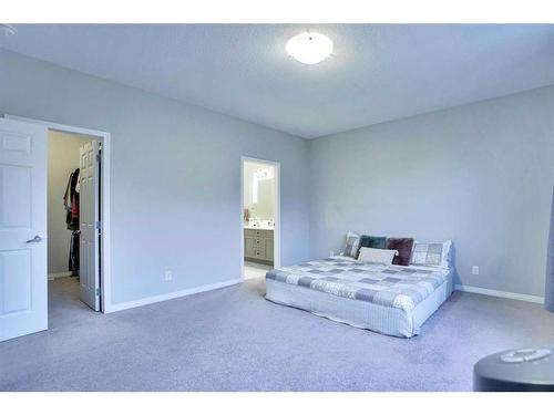 59 Osborne Common Sw, Airdrie, AB - Indoor Photo Showing Bedroom