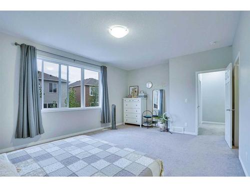 59 Osborne Common Sw, Airdrie, AB - Indoor Photo Showing Bedroom