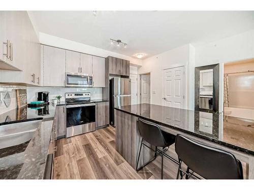 3418-298 Sage Meadows Park Nw, Calgary, AB - Indoor Photo Showing Kitchen With Upgraded Kitchen