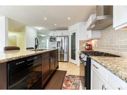 67 Cranford Crescent Se, Calgary, AB - Indoor Photo Showing Kitchen With Upgraded Kitchen