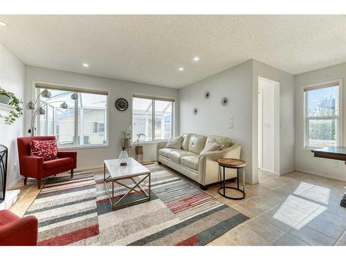 67 Cranford Crescent Se, Calgary, AB - Indoor Photo Showing Living Room