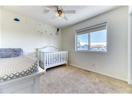 67 Cranford Crescent Se, Calgary, AB - Indoor Photo Showing Bedroom