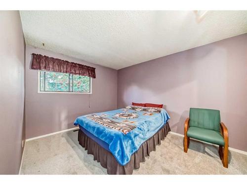 115 Ranchlands Court Nw, Calgary, AB - Indoor Photo Showing Bedroom