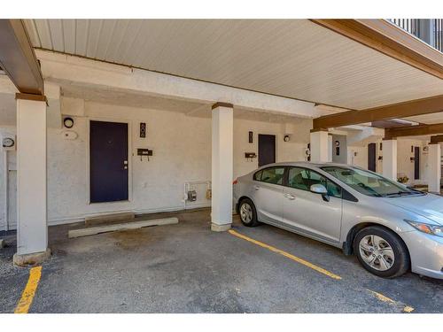 606-2520 Palliser Drive Sw, Calgary, AB - Indoor Photo Showing Garage