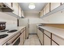 702-221 6 Avenue Se, Calgary, AB  - Indoor Photo Showing Kitchen 