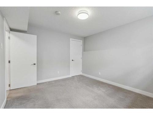 75 Chelsea Street Nw, Calgary, AB - Indoor Photo Showing Other Room