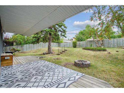 75 Chelsea Street Nw, Calgary, AB - Outdoor With Deck Patio Veranda With Backyard