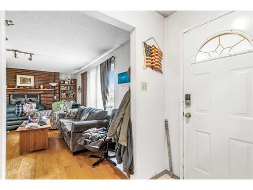 6807 Huntchester Road Ne, Calgary, AB - Indoor With Fireplace