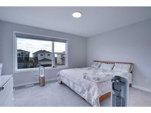 534 Corner Meadows Way Ne Meadows East, Calgary, AB - Indoor Photo Showing Bedroom