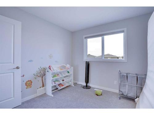 534 Corner Meadows Way Ne Meadows East, Calgary, AB - Indoor Photo Showing Bedroom