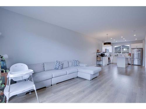 534 Corner Meadows Way Ne Meadows East, Calgary, AB - Indoor Photo Showing Living Room