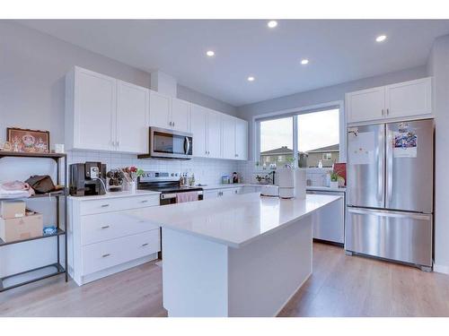 534 Corner Meadows Way Ne Meadows East, Calgary, AB - Indoor Photo Showing Kitchen With Stainless Steel Kitchen