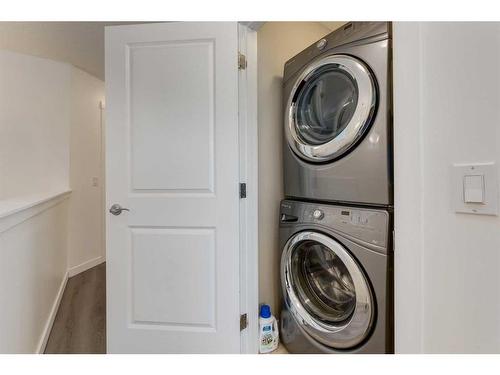 35 Nolanfield Heights Nw, Calgary, AB - Indoor Photo Showing Laundry Room